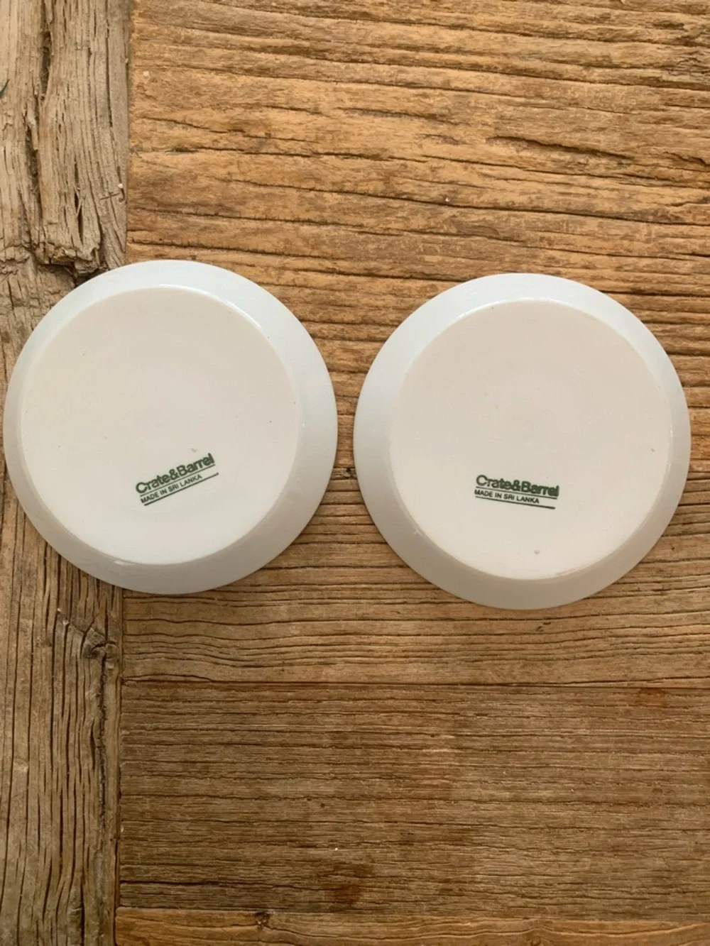 Two Crate and Barrel Espresso Saucers